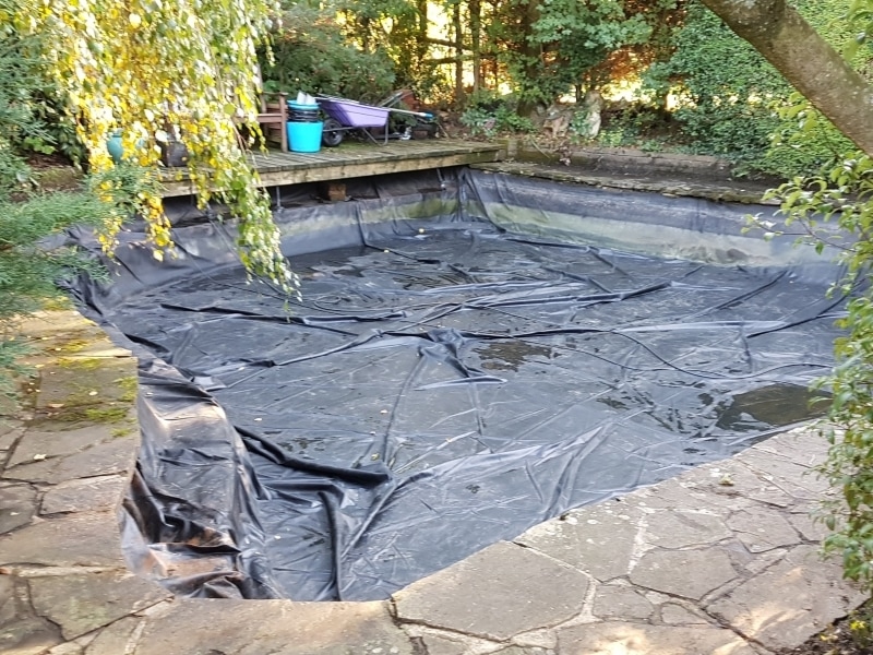 Pond being cleaned